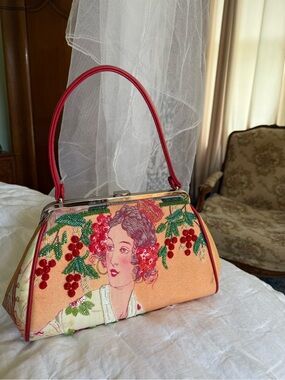 Isabella Fiore Peach and Red Embroidered Portrait Top-Handle Shoulder Bag